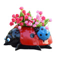 Metal ladybug flower pot